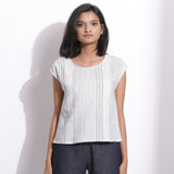 Front View of a Model wearing White Blue Striped Cotton Straight Top