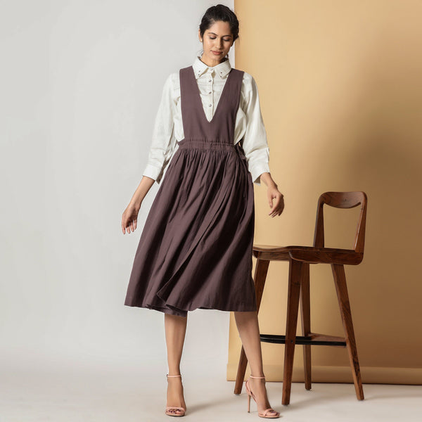 Front View of a Model wearing White Corduroy Shirt and Brown Wrap Dress Set