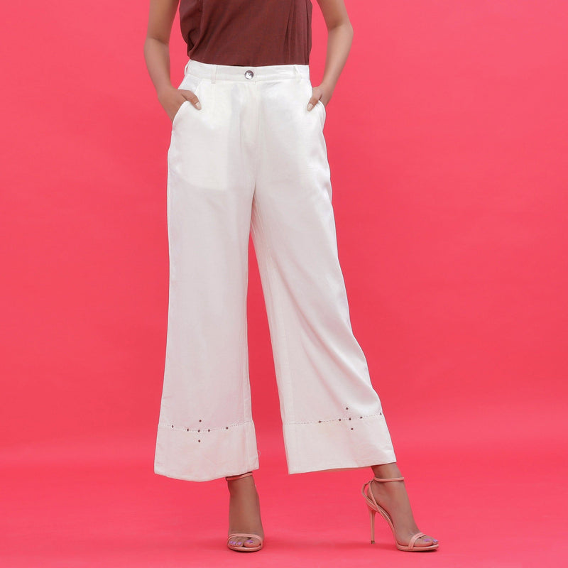 Front View of a Model wearing White Corduroy Hand Beaded Bootcut Pant