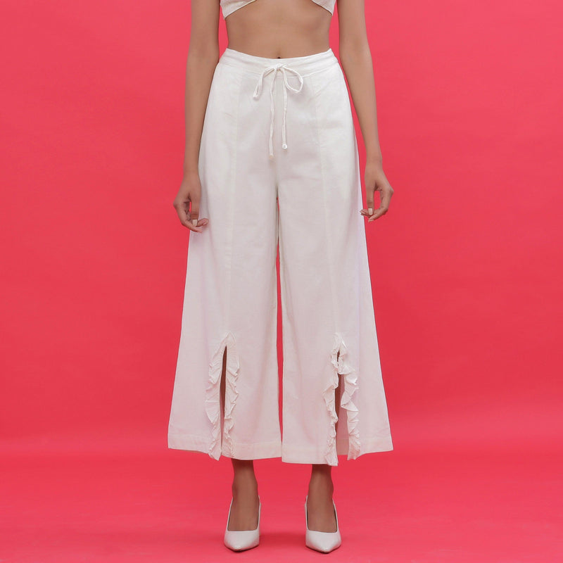 Front View of a Model wearing White Corduroy Slit Wide-Leg Pant