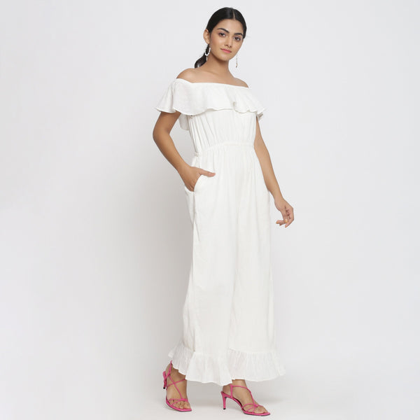 Right View of a Model wearing White Warm Cotton Corduroy Frilled Ankle Length Jumpsuit