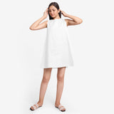 Front View of a Model wearing White Cotton Flax Kangaroo Pocket Dress