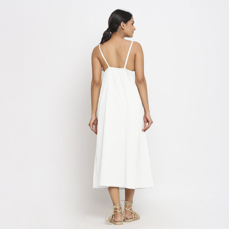 Back View of a Model wearing White Cotton Flax Strap Sleeve A-Line Dress