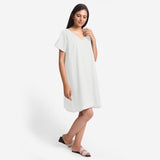 Right View of a Model wearing White Cotton Flax V-Neck Tunic