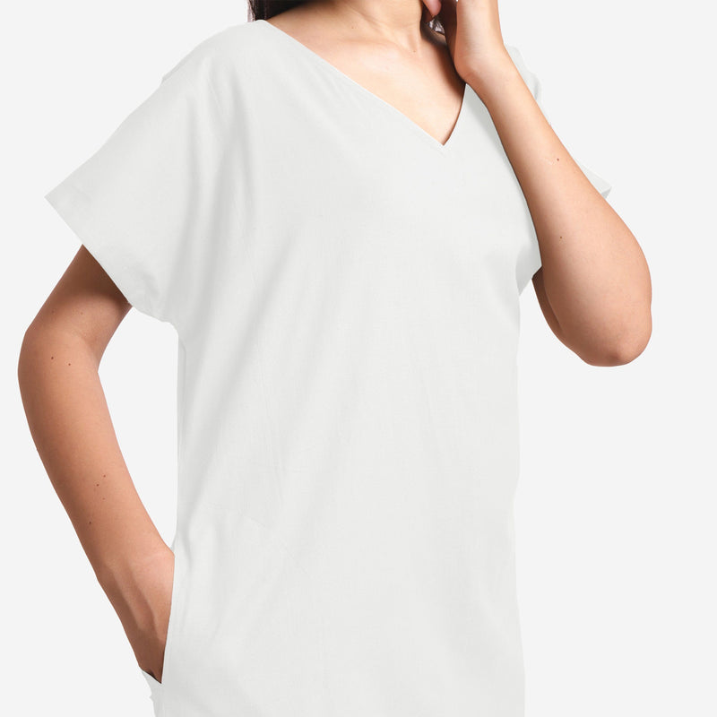 Front Detail of a Model wearing White Cotton Flax V-Neck Tunic