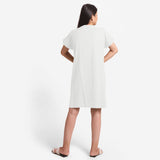 Back View of a Model wearing White Cotton Flax V-Neck Tunic