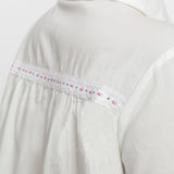 Back Detail of a Model wearing White Organic Cotton Lined Peter Pan Gathered Top