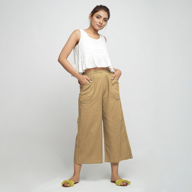 Front View of a Model wearing White Cotton Top and Beige Straight Pant Set