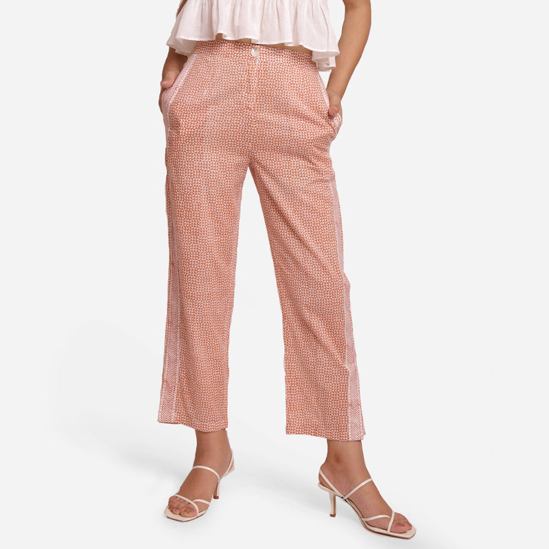 Front View of a Model wearing Rust Ankle Length Cotton Straight Pant
