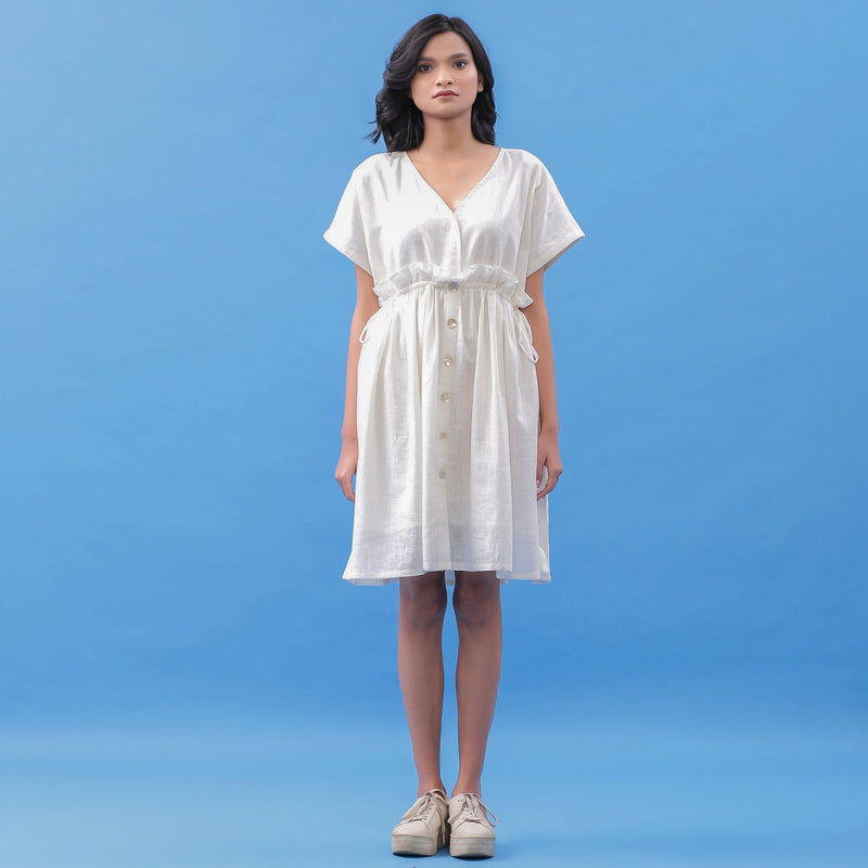 Front View of a Model wearing White Cotton V-Neck Frilled Bohemian Dress