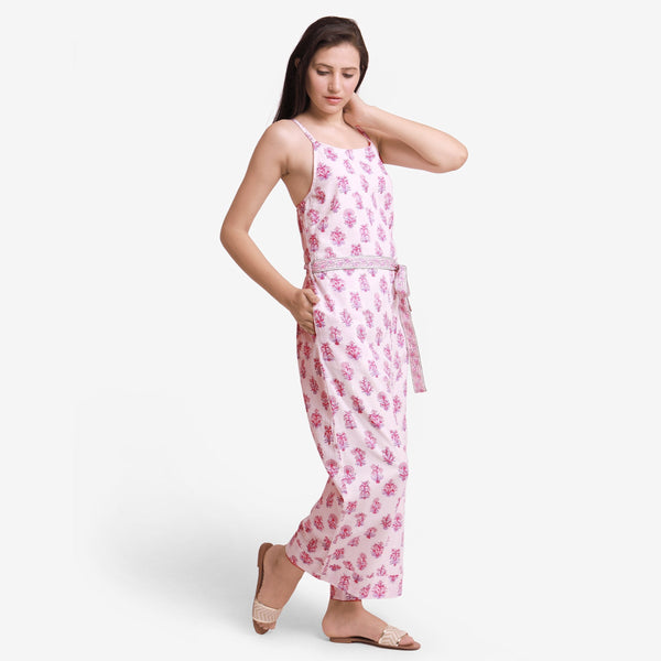 Left View of a Model wearing White Block Print Ankle Length Cotton Camisole Jumpsuit