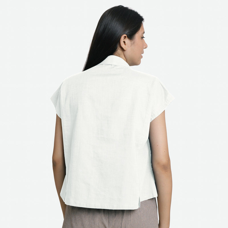 Back View of a Model wearing White Deep Neck Button-Down Cotton Top
