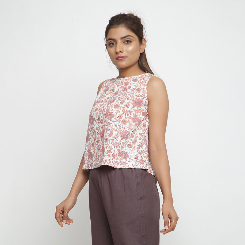 Left View of a Model wearing White Floral Printed Sleeveless Top