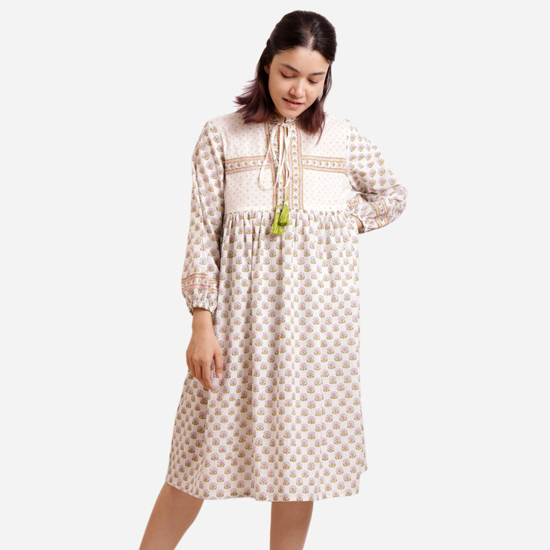 Front View of a Model wearing White Floral Block Printed Cotton Knee Length Dress
