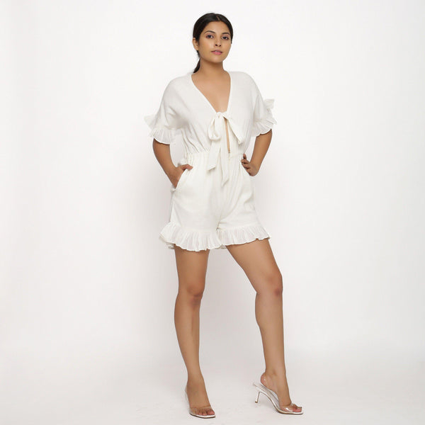 Front View of a Model wearing White Frilled Sleeve Cotton Playsuit