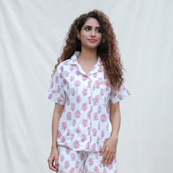 Front View of a Model wearing White and Fuchsia Block Printed Cotton Half Sleeve Shirt