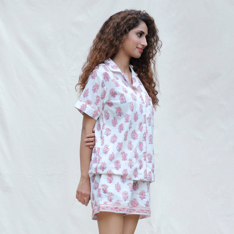 Right View of a Model wearing White and Fuchsia Block Printed Cotton Half Sleeve Shirt