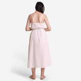 Back View of a Model wearing White Hand Beaded Cotton Camisole Maxi Dress