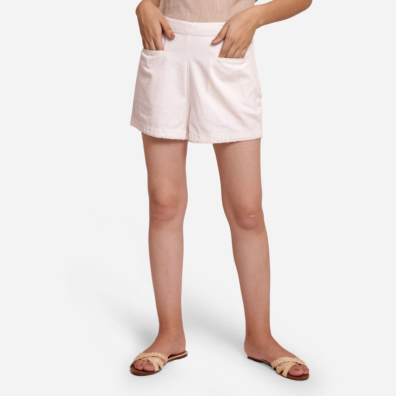 Front View of a Model wearing White Hand Beaded Short Cotton Shorts
