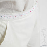 Front Detail of a Model wearing Solid White Hand Beaded Straight Pant