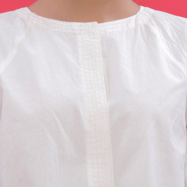 Front Detail of a Model wearing White Hand Embroidered Straight Top