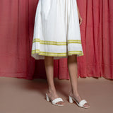 Close View of a Model wearing White Organic Cotton Block Print Lace Sundress