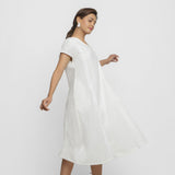 Right View of a Model wearing White Organic Cotton Lace Midi Flared Dress