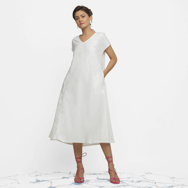 Front View of a Model wearing White Organic Cotton Lace Midi Flared Dress