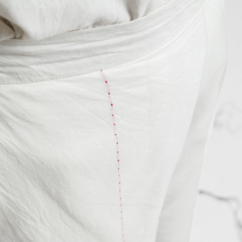 Front Detail of a Model wearing Off-White Banded Hem Straight Pant