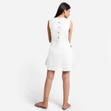 Back View of a Model wearing White Patch Pocket Round Neck Dress