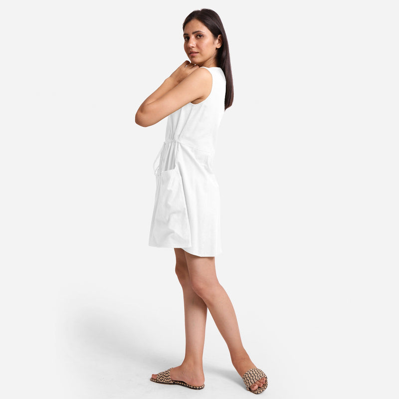 Left View of a Model wearing White Patch Pocket Round Neck Dress