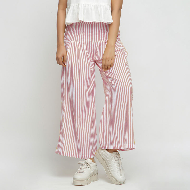 Front View of a Model wearing Pink Striped Hand Screen Print Elasticated Cotton Wide Legged Pant