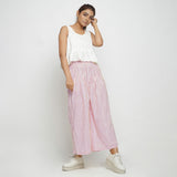 Front View of a Model wearing Off-White Cotton Peplum Top and Pink Striped Elasticated Pant Co-ord Set