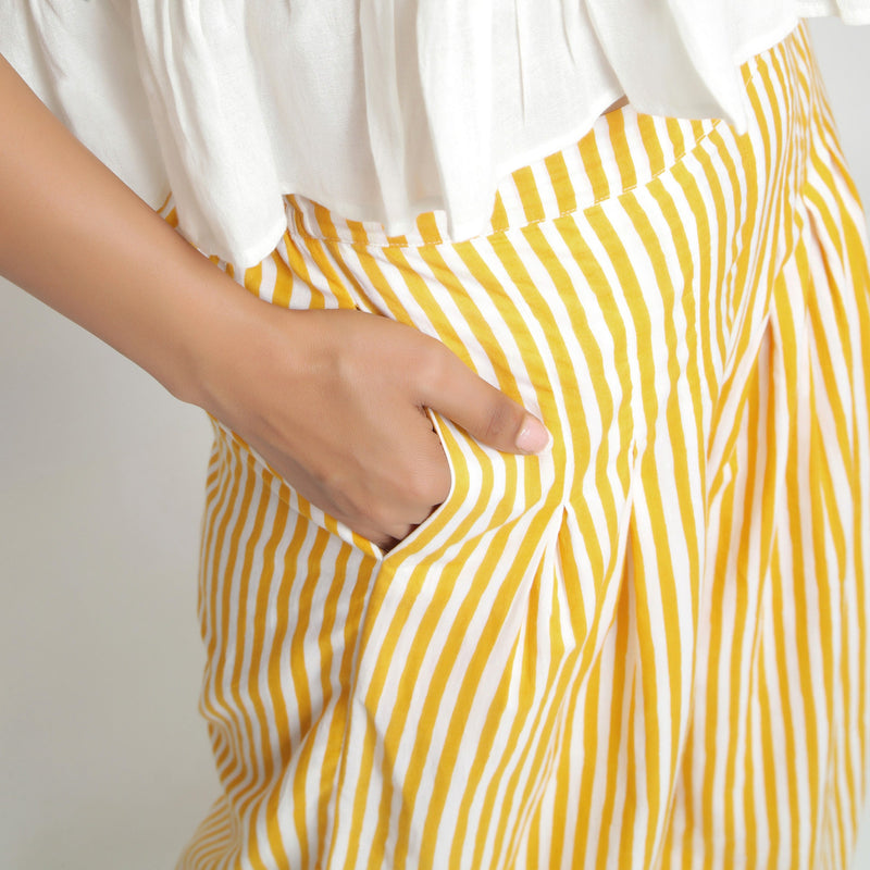 Front Detail of a Model wearing Yellow Striped Hand Screen Print Elasticated Wide Legged Cotton Pant