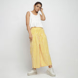 Front View of a Model wearing White Cotton Peplum Top and Yellow Elasticated Pant Co-ord Set