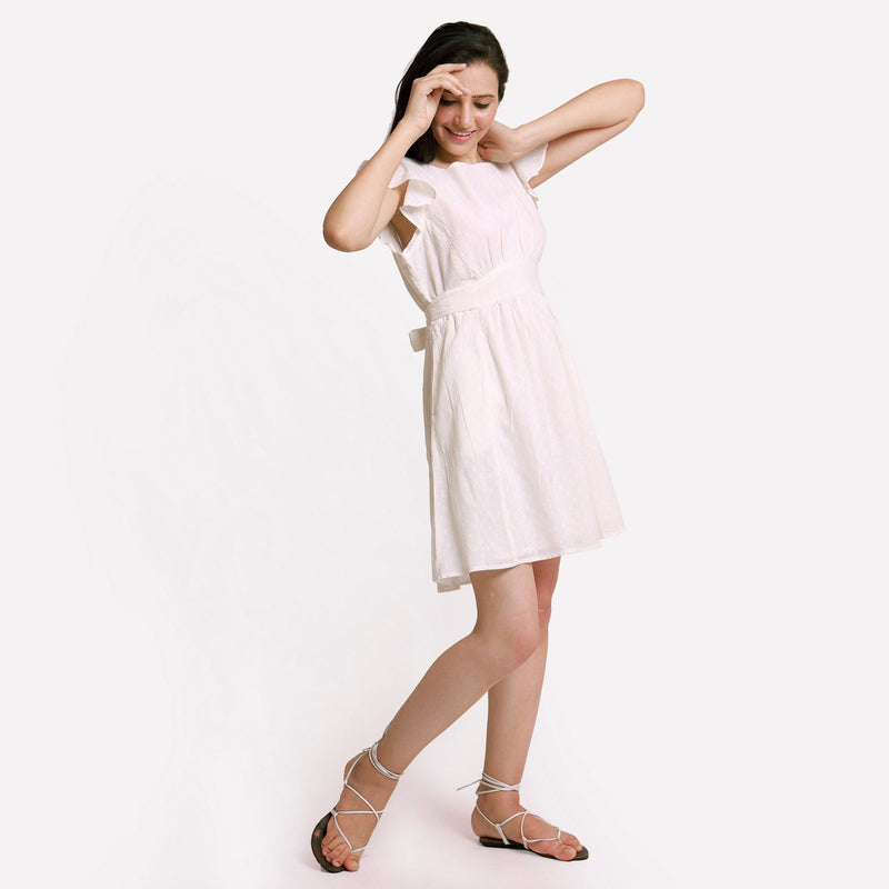 Right View of a Model wearing White Princess Line Backless Short Dress