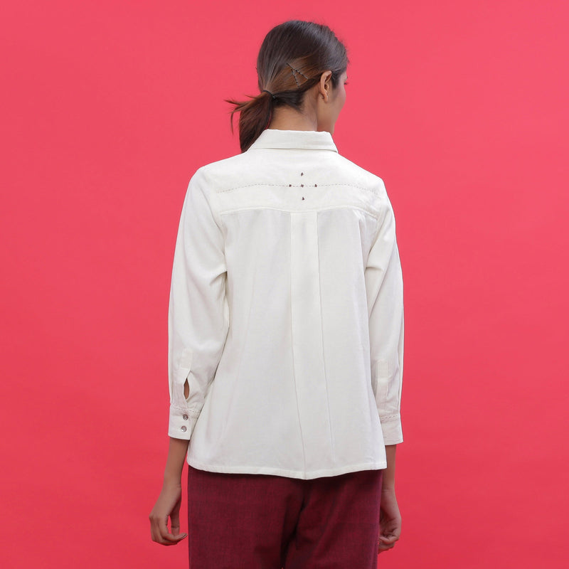 Back View of a Model wearing White Corduroy Hand-Beaded Shirt