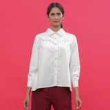 Front View of a Model wearing White Corduroy Hand-Beaded Shirt