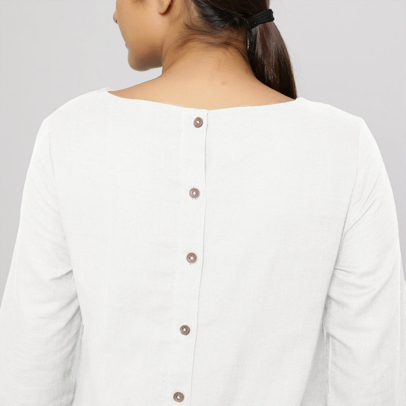 Back Detail of a Model wearing White Yoked Cotton Tunic Dress