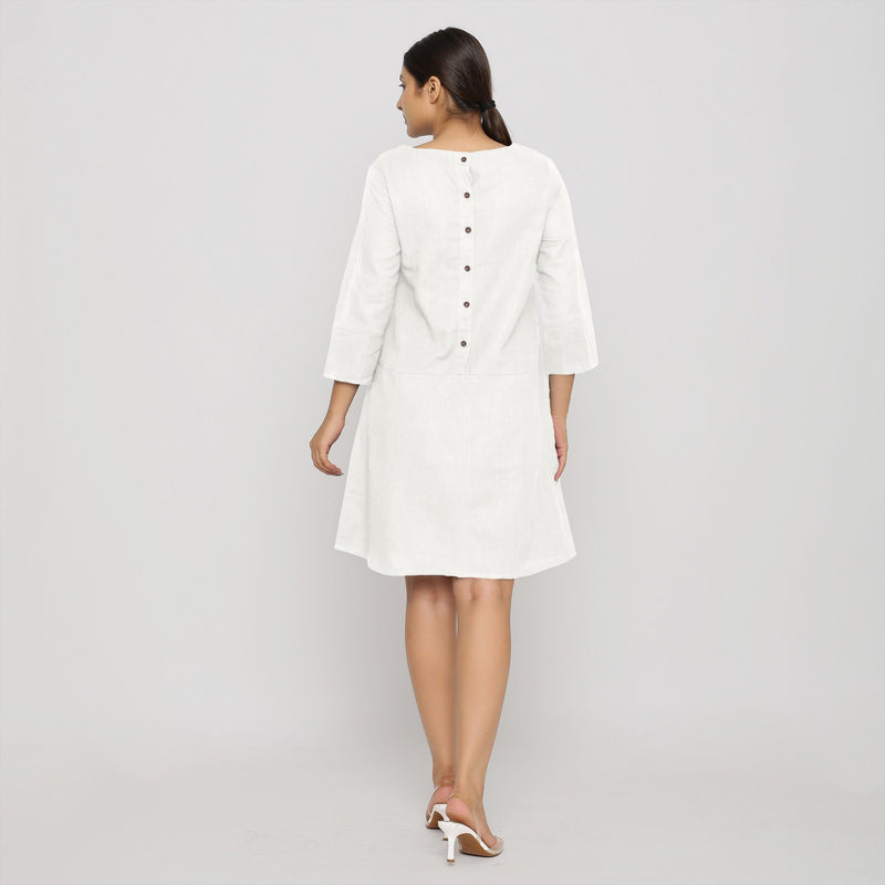 Back View of a Model wearing White Yoked Cotton Tunic Dress