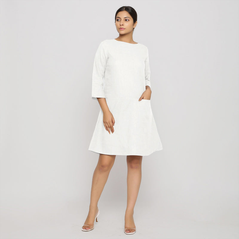 Front View of a Model wearing White Yoked Cotton Tunic Dress