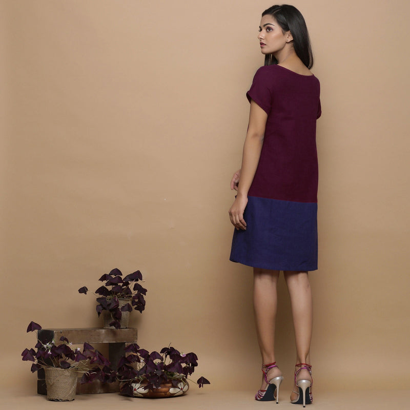 Back View of a Model wearing Wine and Navy Blue Handspun Cotton Paneled Boat Neck Shift Dress
