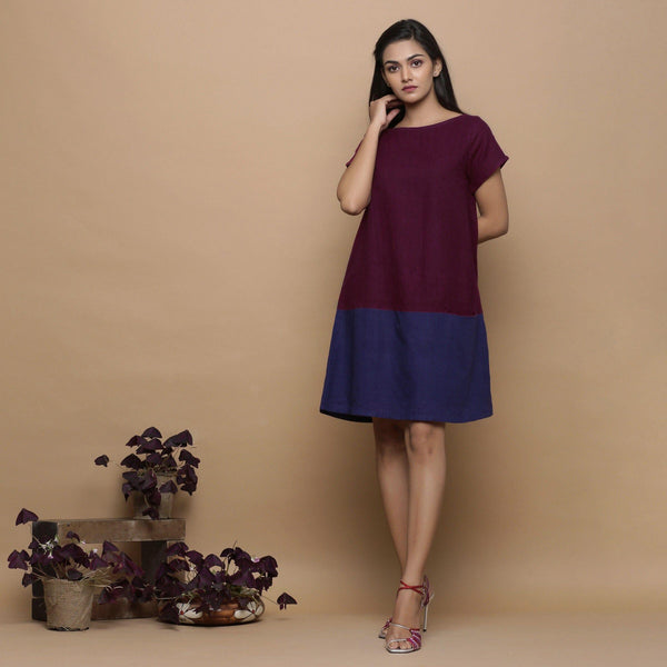 Front View of a Model wearing Wine and Navy Blue Handspun Cotton Paneled Boat Neck Shift Dress