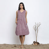 Front View of a Model wearing Wine Cotton Muslin Knee Length V-Neck Shirt Dress