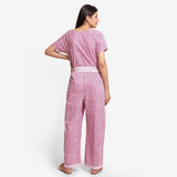 Back View of a Model wearing Wine Block Printed Cotton Ankle Length Wrap Jumpsuit