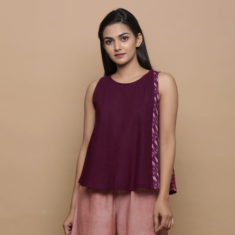 Front View of a Model wearing Wine Handwoven 100% Cotton Ikat Sleeveless Paneled Top