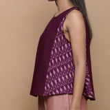 Left Detail of a Model wearing Wine Handwoven 100% Cotton Ikat Sleeveless Paneled Top