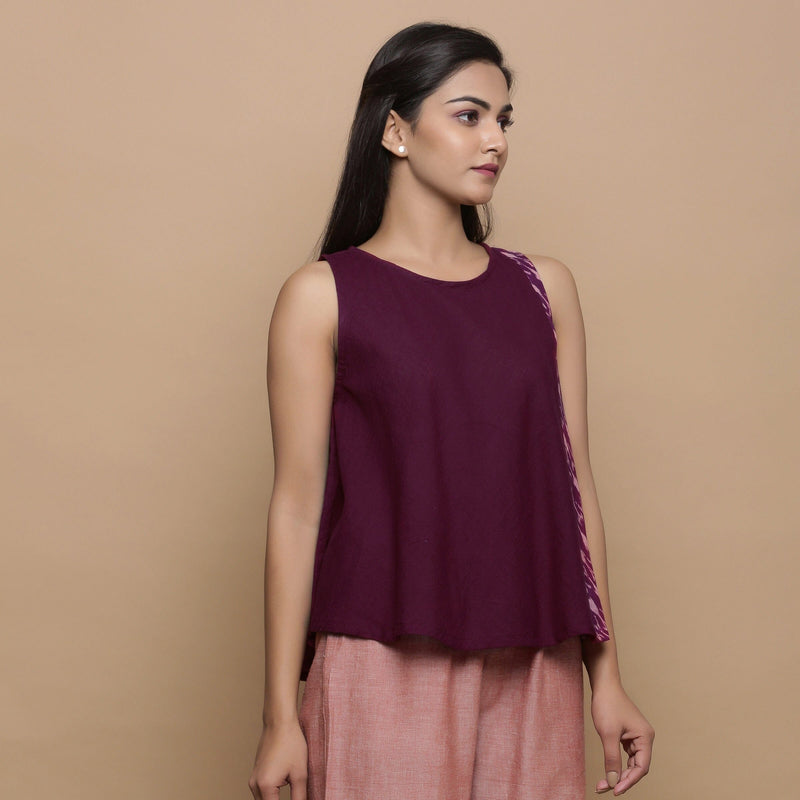 Right View of a Model wearing Wine Handwoven 100% Cotton Ikat Sleeveless Paneled Top