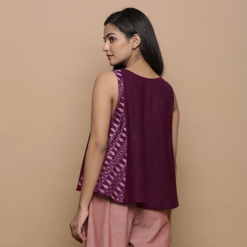 Back View of a Model wearing Wine Handwoven 100% Cotton Ikat Sleeveless Paneled Top
