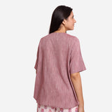 Back View of a Model wearing Wine Yarn Dyed 100% Cotton High-Low Tunic Top